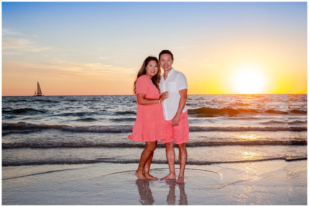 couple posing for picture at sunset