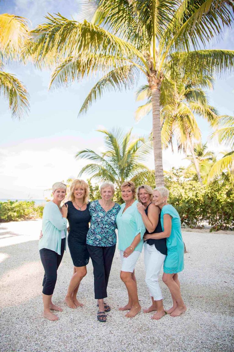 friends together hugging under palm tree- tampa florida photographer