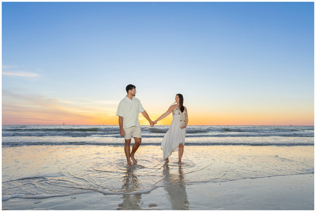 couple posing for tampa maternity photographer