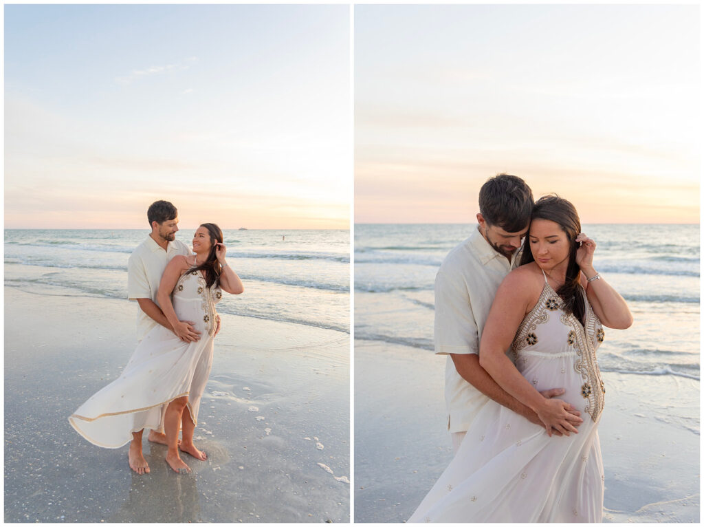 pregnant couple on the beach