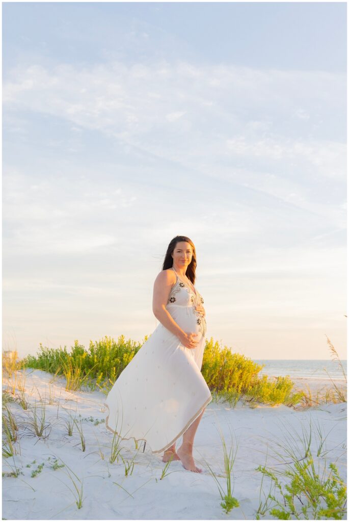 couple posing for tampa maternity photographer